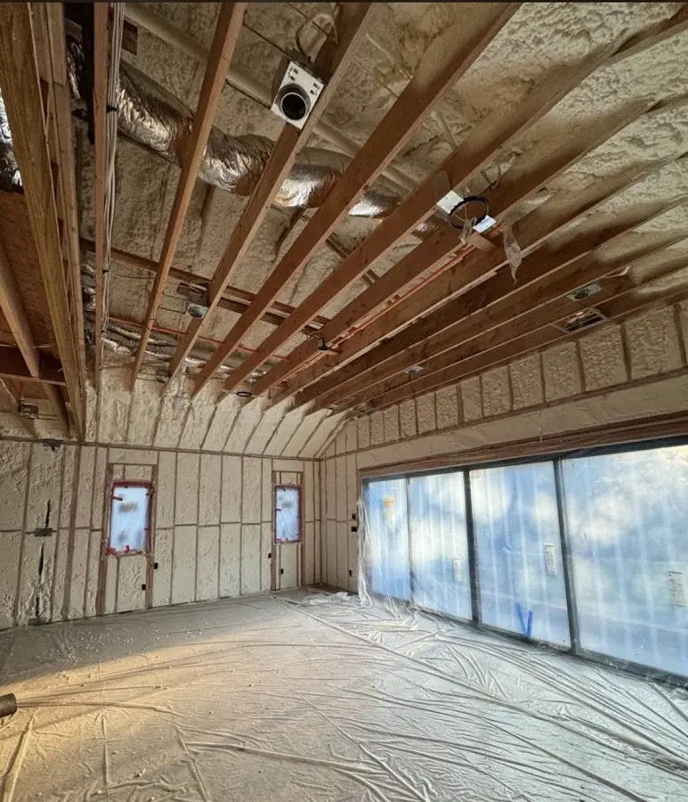 Interior walls and ceiling insulated with spray foam during new construction in Happy Valley